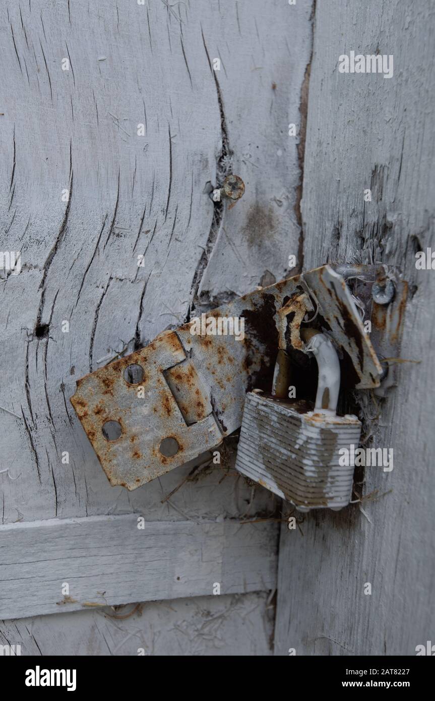 Pad lock on old door Stock Photo