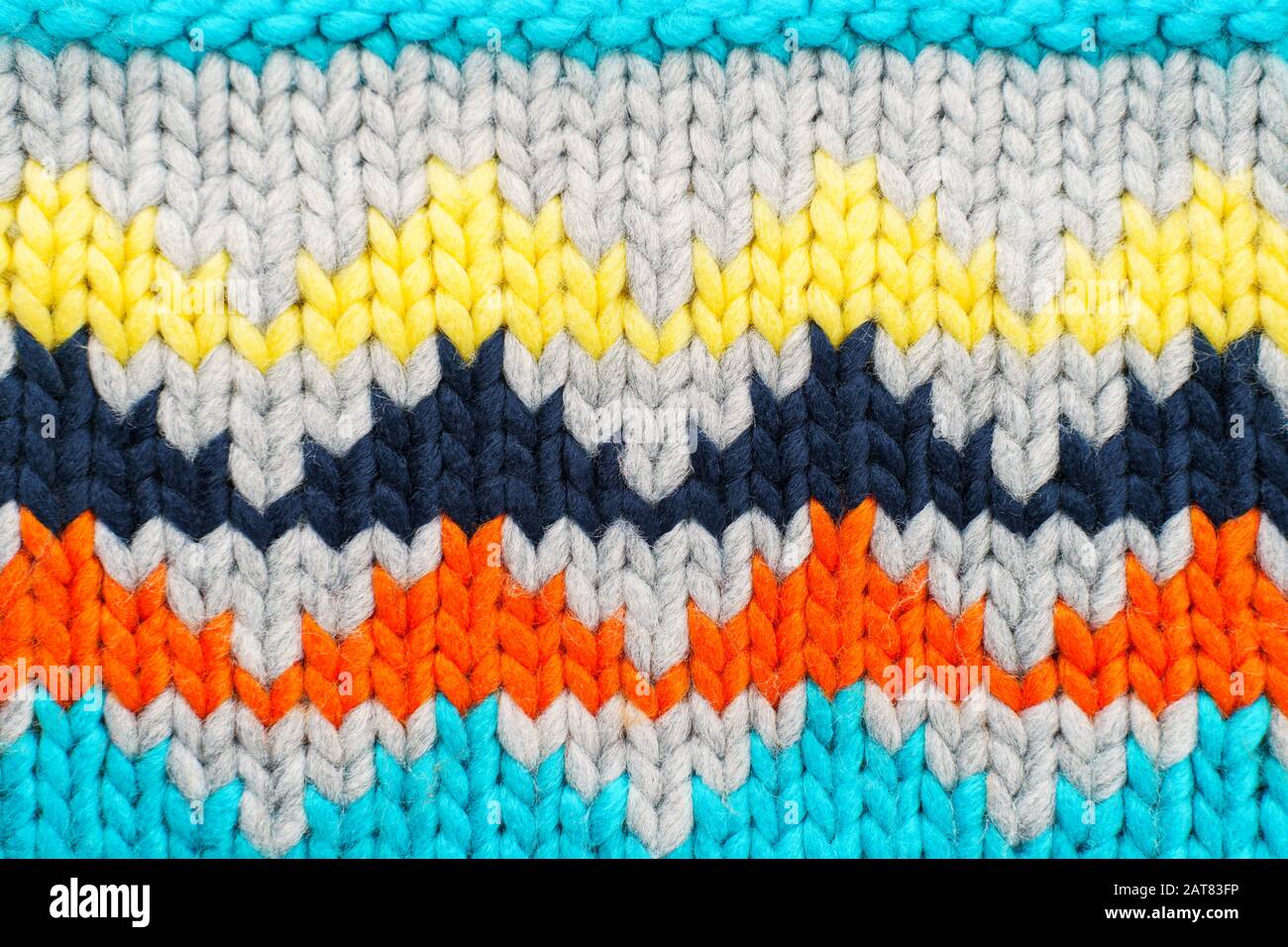 Handmade knitted multi-colored pattern. Hobby background Stock Photo