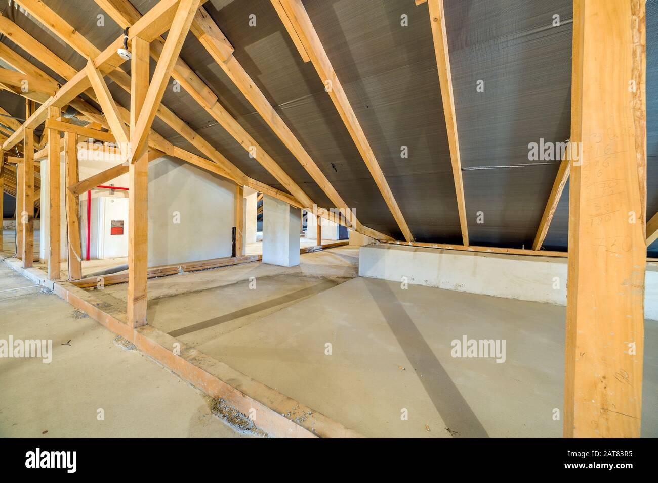 Attic of a building with wooden beams of a roof structure Stock Photo ...