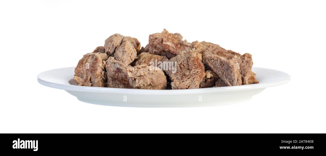 Boiled beef on a white plate isolated on a white background Stock Photo ...
