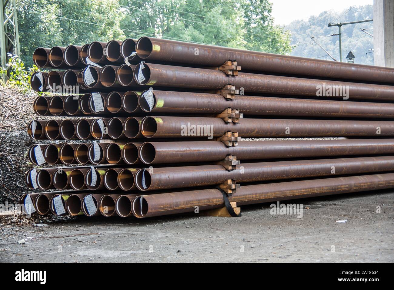 long rusted steel pipes stacked for gas pipes Stock Photo Alamy
