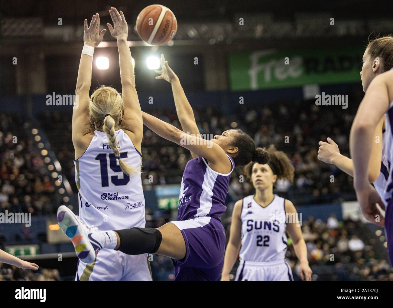 Birmingham, UK, 26 January, 2020.  Sevenoaks Suns defeat Durham Palatinates, 74-64 to win the WBBL cup at Arena Birmingham, Birmingham UK. Durham's Nicolette Fyong Lyew Quee reaches for the ball, Suns' Judi Fritz (15) with the block.  . copyright Carol Moir. Stock Photo