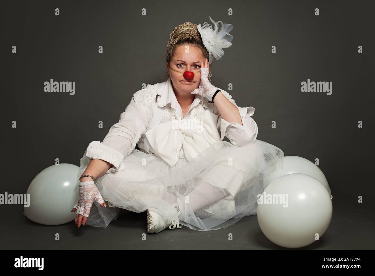 Portrait of woman clown. Performance Actress at work, White Clown Character Stock Photo