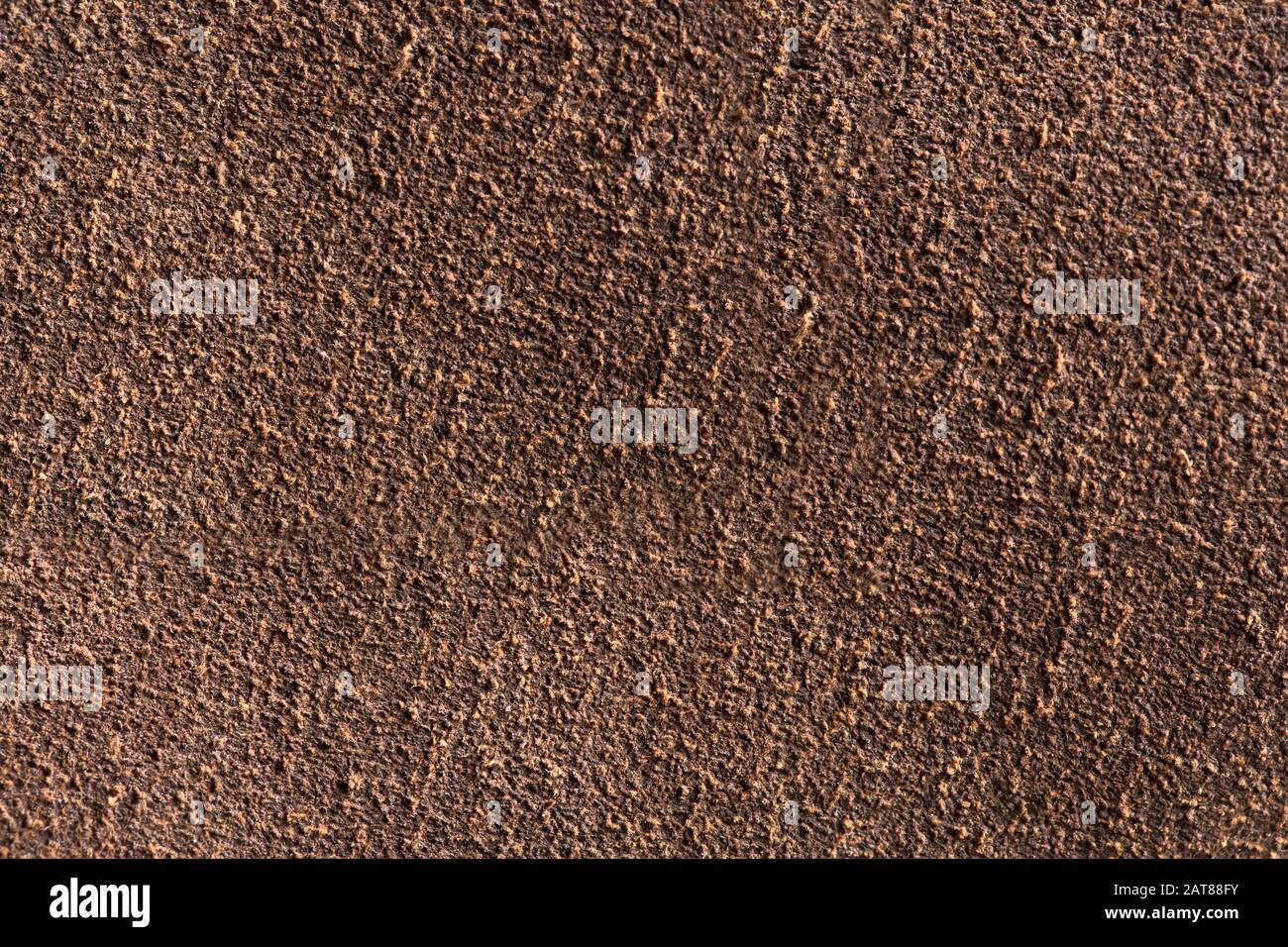 Background macro texture of suede brown leather. Stock Photo