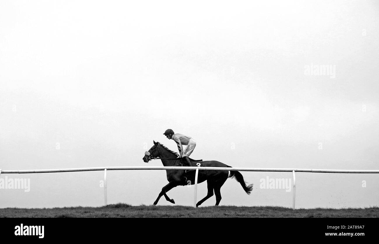 Blackjack Kentucky ridden by Harry Cobden goes to post prior to The Chepstow Trade Centre Novices Hurdle at Chepstow Racecourse. Stock Photo