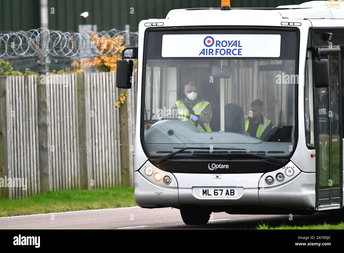 Royal airforce bus transporting staff wearing facemasks raf brize hi ...
