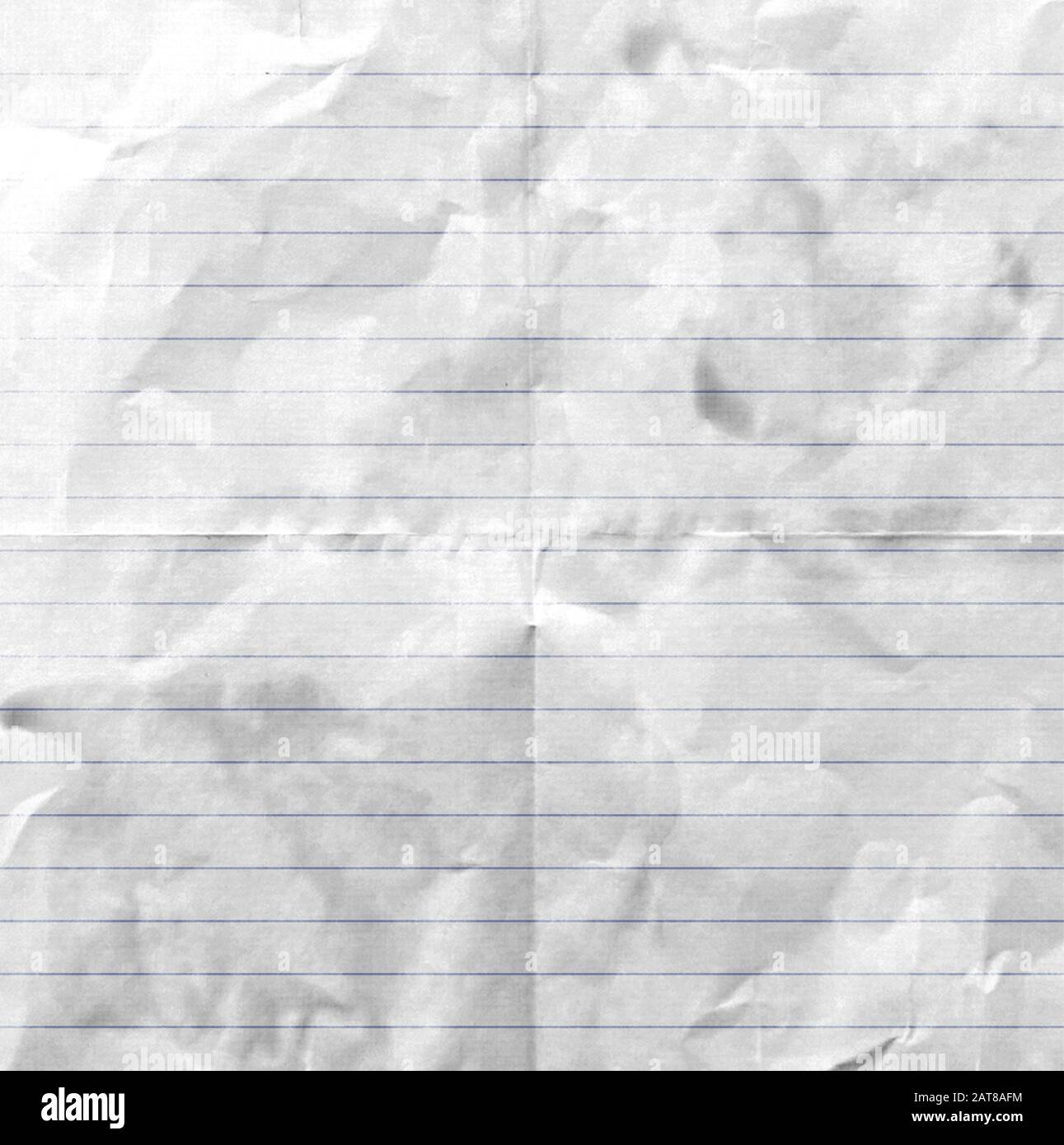 full-frame wrinkled and folded lined writing paper background Stock Photo