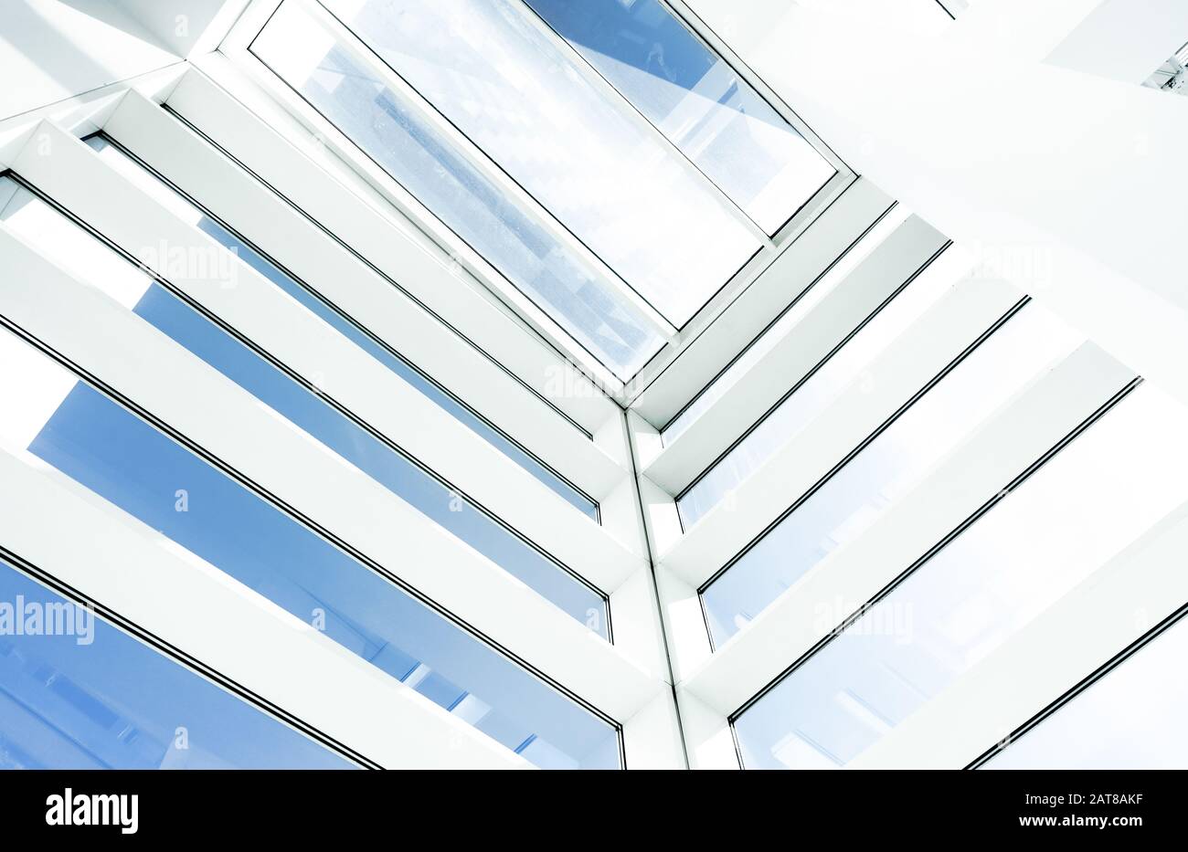 Low angle shot of an inside of a modern building with rectangular glass ...
