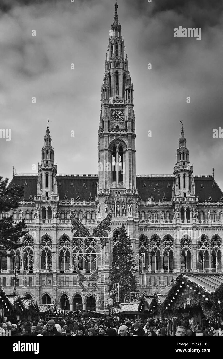 VIENNA, AUSTRIA - Dec 20, 2019: A vertical greyscale shot of Rathaus City hall in Vienna Stock Photo