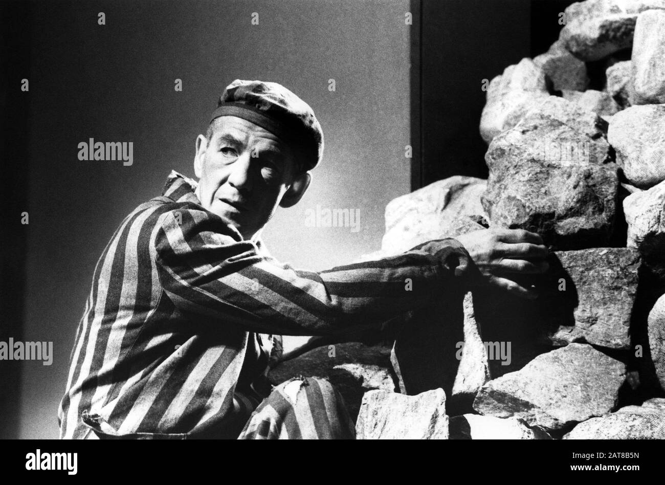 Ian McKellen (Max) in BENT by Martin Sherman directed by Sean Mathias at the Lyttelton Theatre, National Theatre (NT), London in 1990. Sir Ian Murray McKellen, born 1939, Burnley, England. English stage and film actor. Co-founder of Stonewall, gay rights activist, knighted in 1990, made a Companion of Honour 2007. Stock Photo