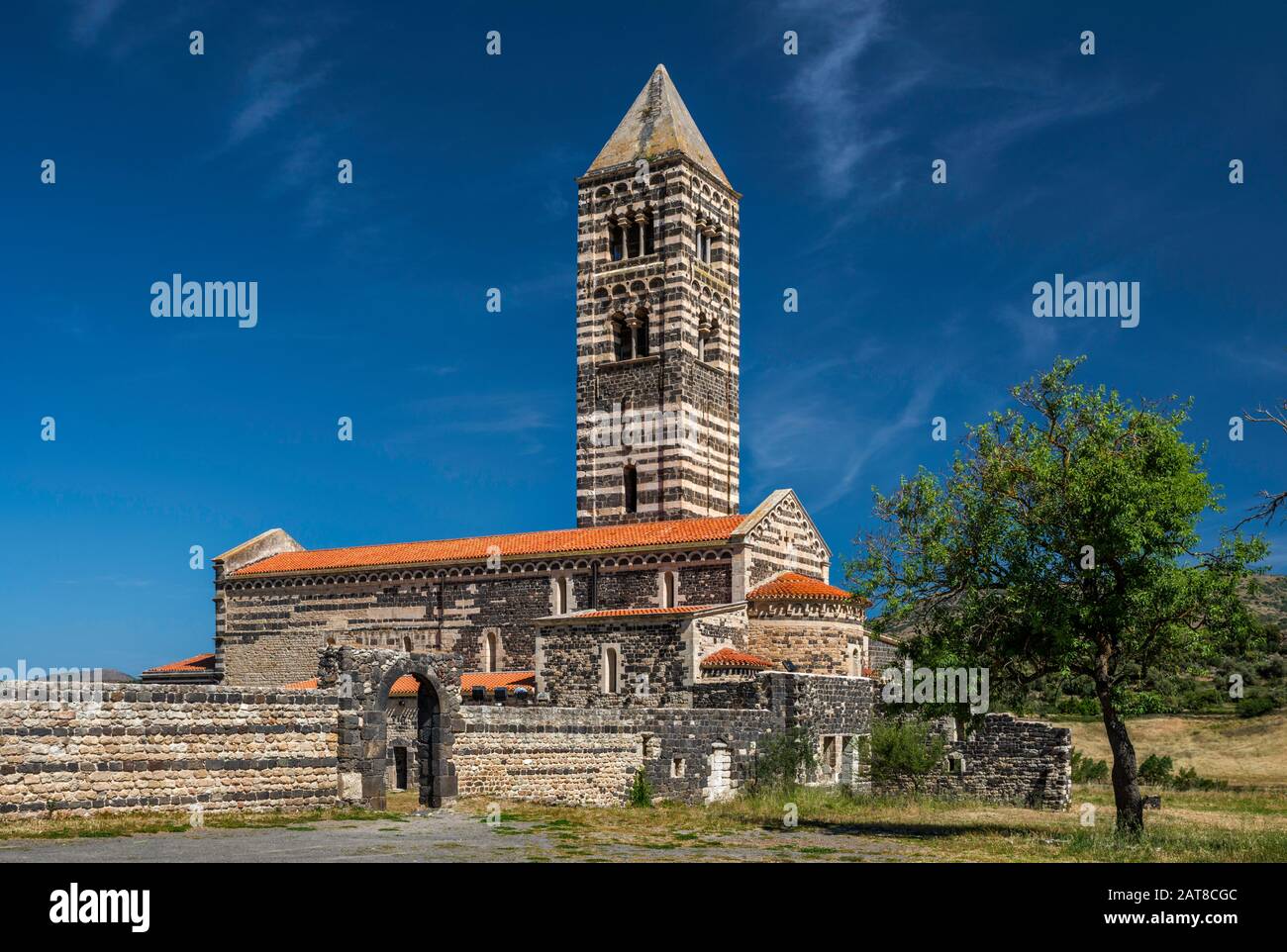 Basilica of the Holy Trinity of Saccargia, 1116, Romanesque style, near Codrongianos, Logudoro region, Sassari province, Sardinia, Italy Stock Photo