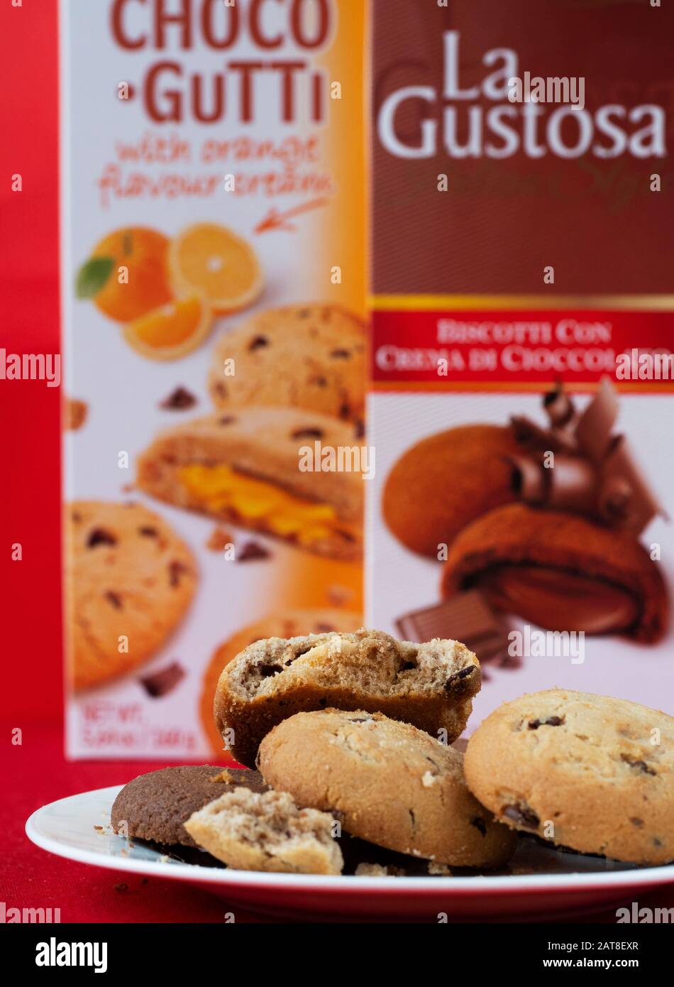 Cookies La Gustosa and Choco Gutti Bogutti company on a white plate on