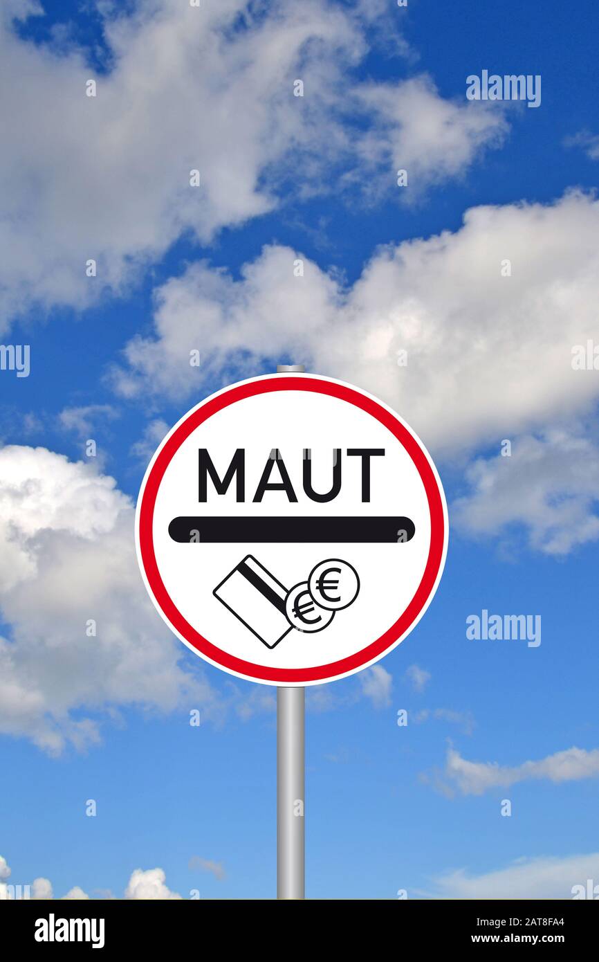 sign Maut, road tax in front of cloudy bue sky, composing, Germany Stock Photo