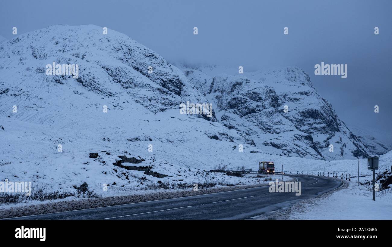 One of the most scenic road trips in the Scotland The A82 weaves it way through the Glencoe Valley in Winter, Stock Photo