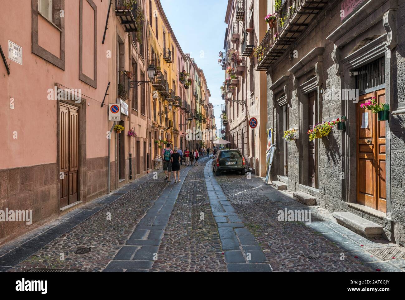 Corso Vittorio Emanuele II, cobblestone street at historic center of Bosa, Oristano province, Sardinia, Italy Stock Photo