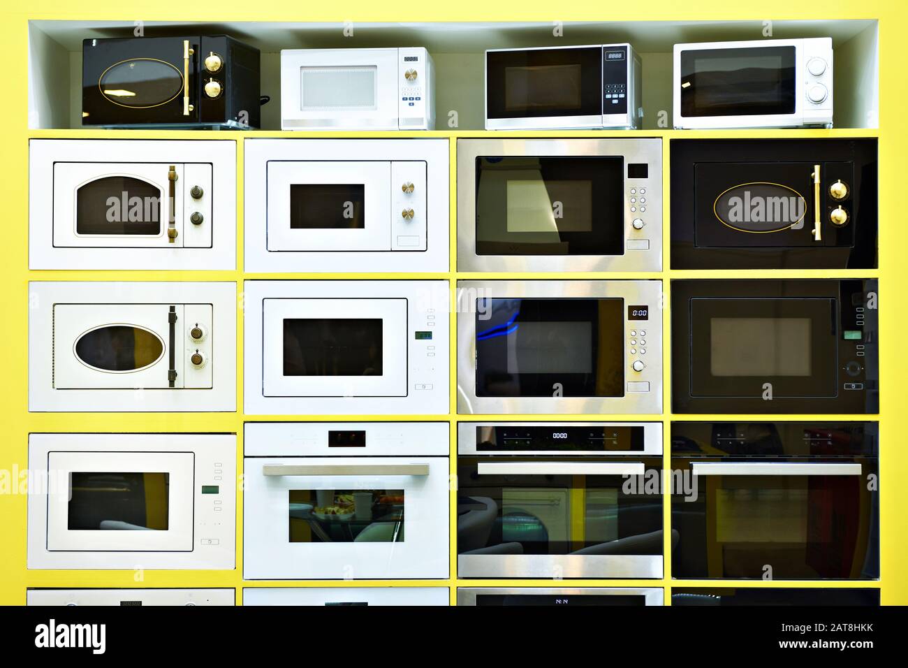 Microwave ovens on display at the store Stock Photo