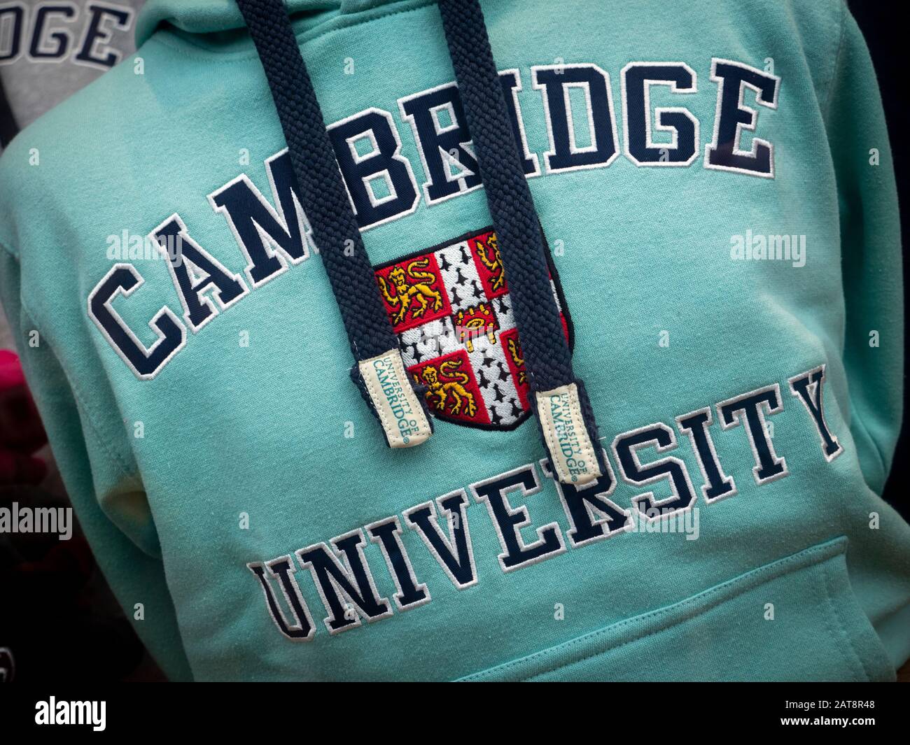 A Cambridge Blue Cambridge University sweatshirt in the shop window at Ryder and Amies a university clothes supplier in Cambridge UK Stock Photo