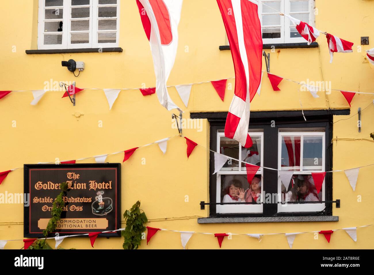 The Golden Lion Hotel, the starting point of the 'Old Oss' or red oss procession, Obby Oss procession, Padstow, Cornwall, UK Stock Photo