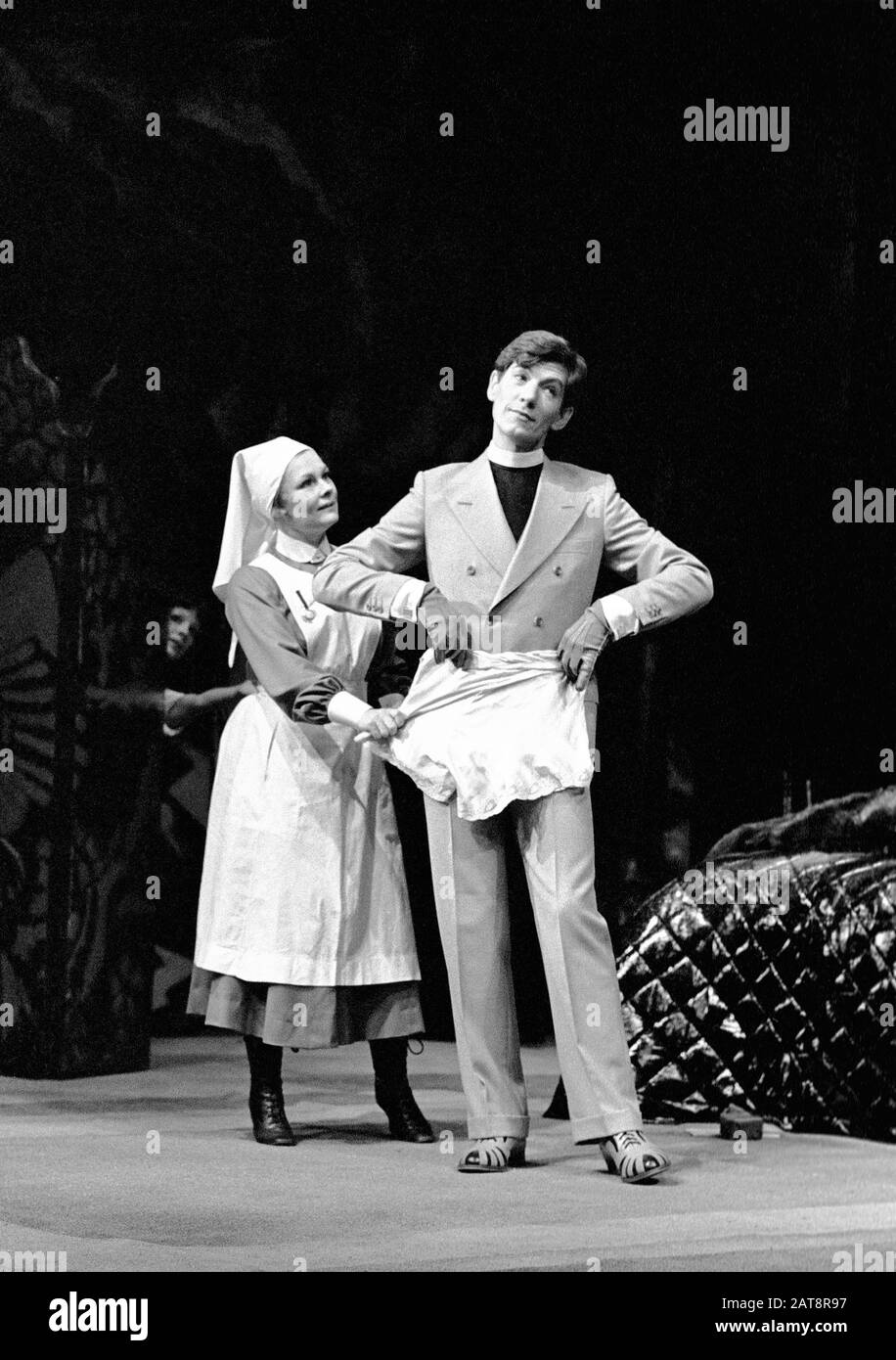 Judi Dench (Sweetie Simpkins) and Ian McKellen (Aubrey Bagot) in TOO TRUE TO BE GOOD by George Bernard Shaw directed by Clifford Williams for Royal Shakespeare Company (RSC) at the Aldwych Theatre, London in 1975.  Sir Ian Murray McKellen, born 1939, Burnley, England. English stage and film actor. Co-founder of Stonewall, gay rights activist, knighted in 1990, made a Companion of Honour 2007. Dame Judith Olivia Dench CH DBE FRSA, born 1934. Married to the actor Michael Williams from 1971 until his death in 2001. They had one daughter, the actress Finty Williams, born in 1972. Stock Photo