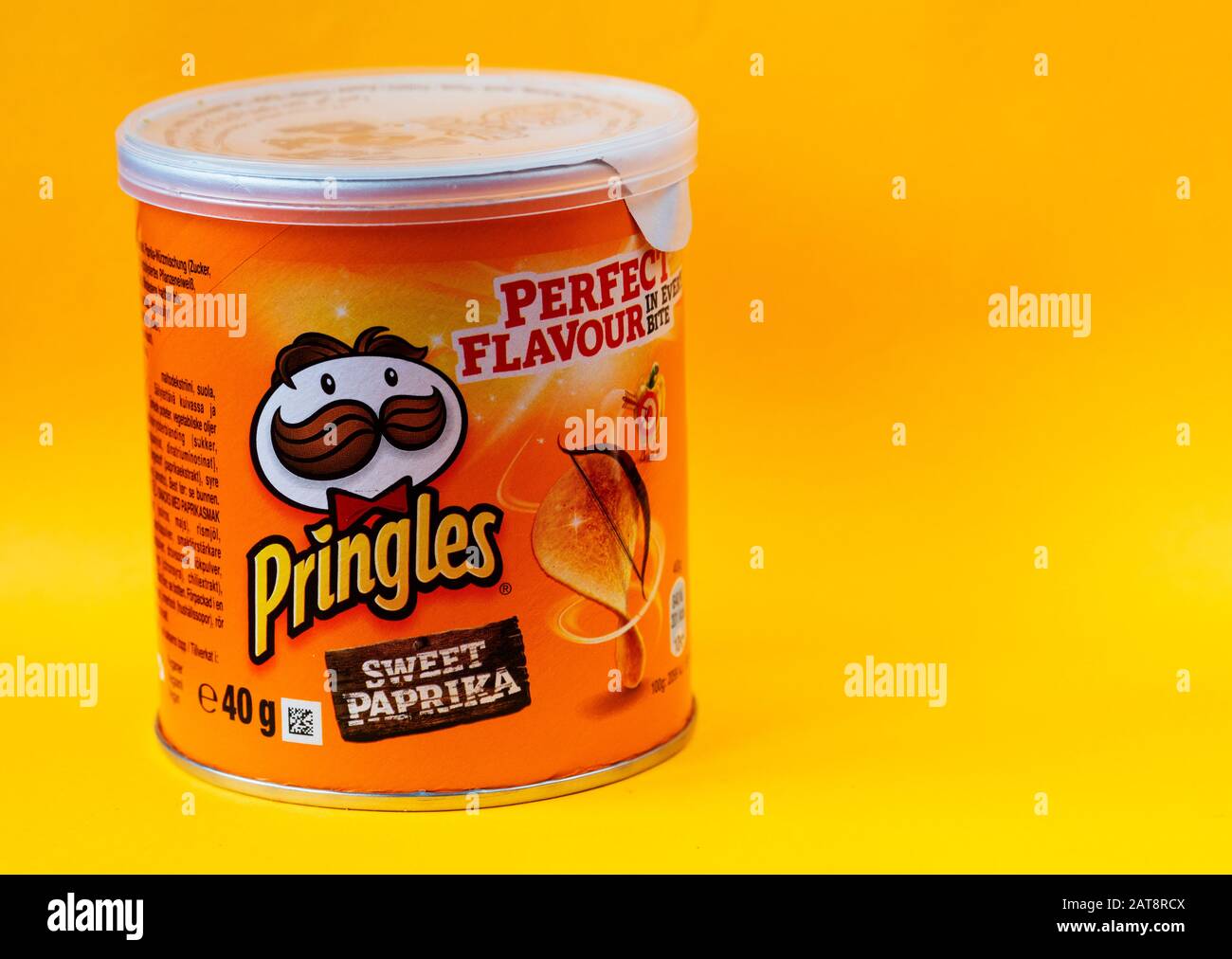 In this photo illustration a Pringles Crisps container on Yellow