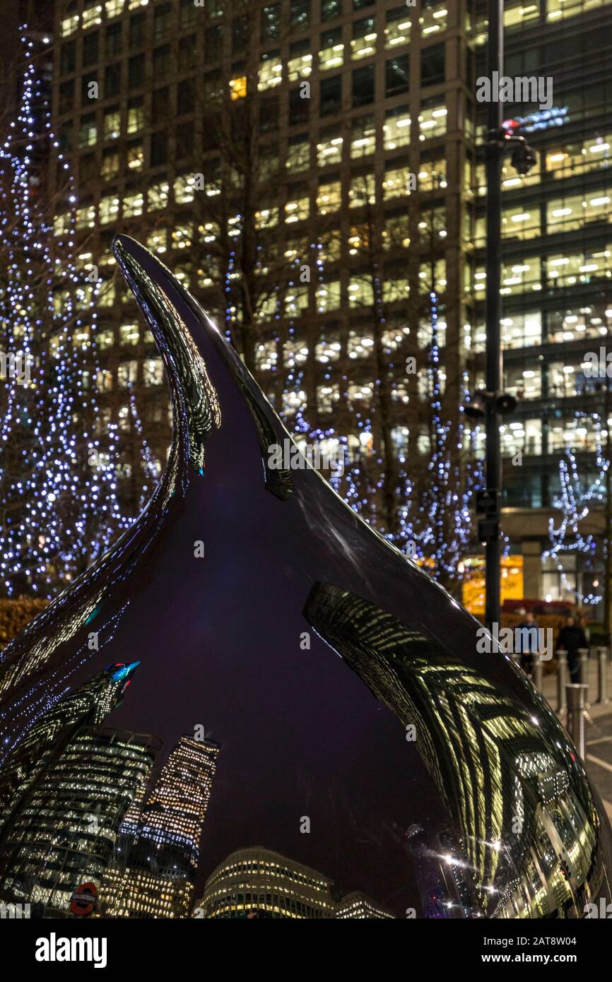 Reflections in a sculpture at Reuters Place, during 2020 Winter lights festival in Canary Wharf, London, England. Stock Photo