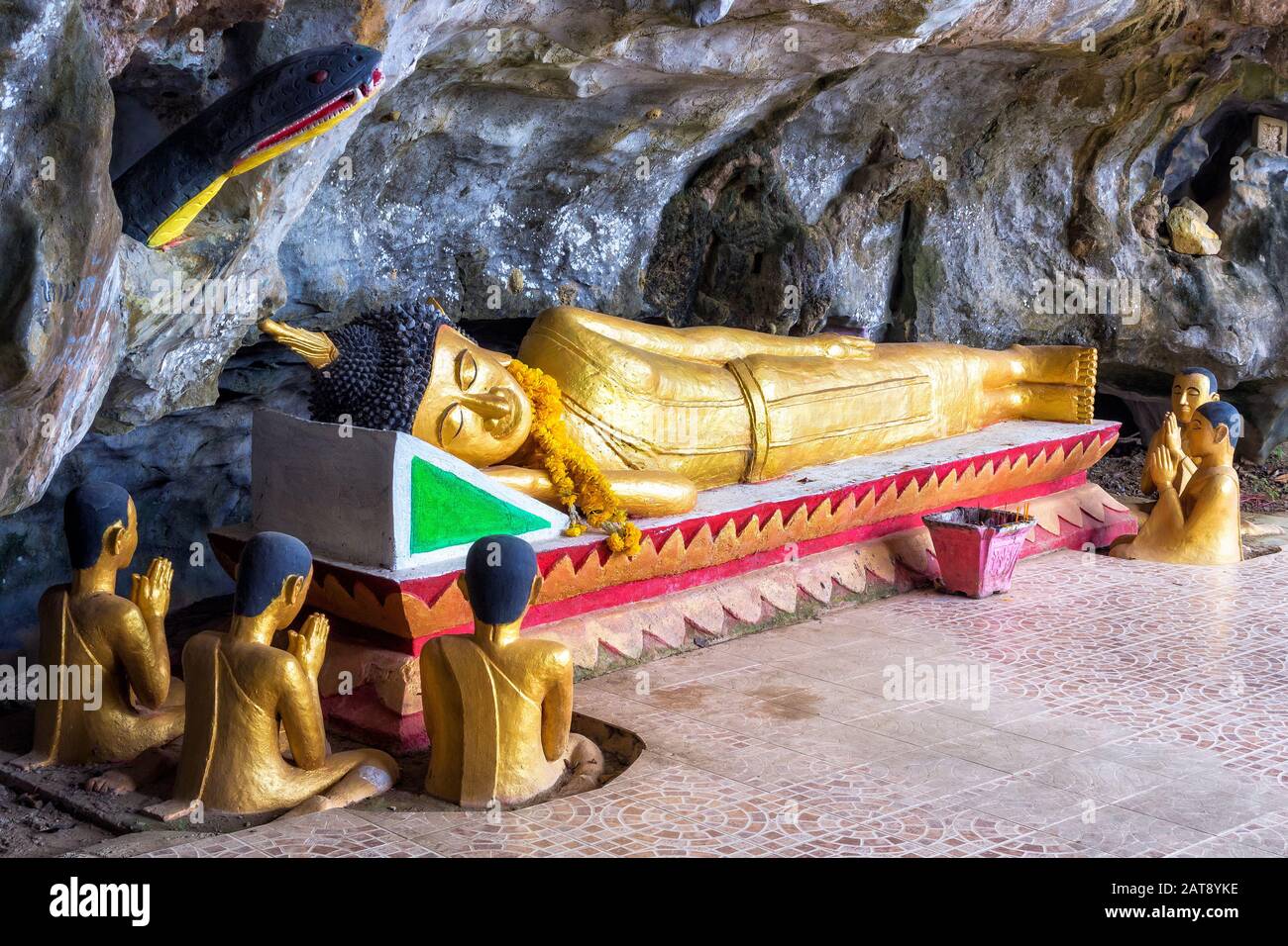 Reclining Buddha at the Elephant Cave in Vang Vieng, Laos. Stock Photo