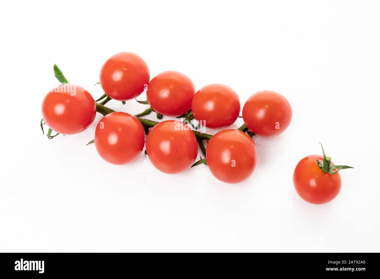 Cherry tomatoes isolated on white background Stock Photo - Alamy