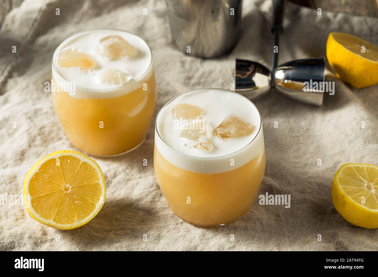 Alcoholic Tequila Lemon Sour Cocktail with Egg White Stock Photo Alamy