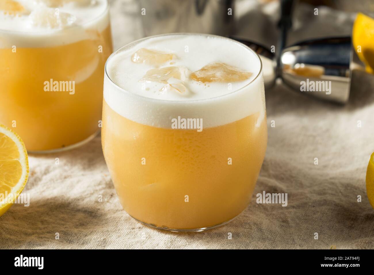 Alcoholic Tequila Lemon Sour Cocktail with Egg White Stock Photo Alamy