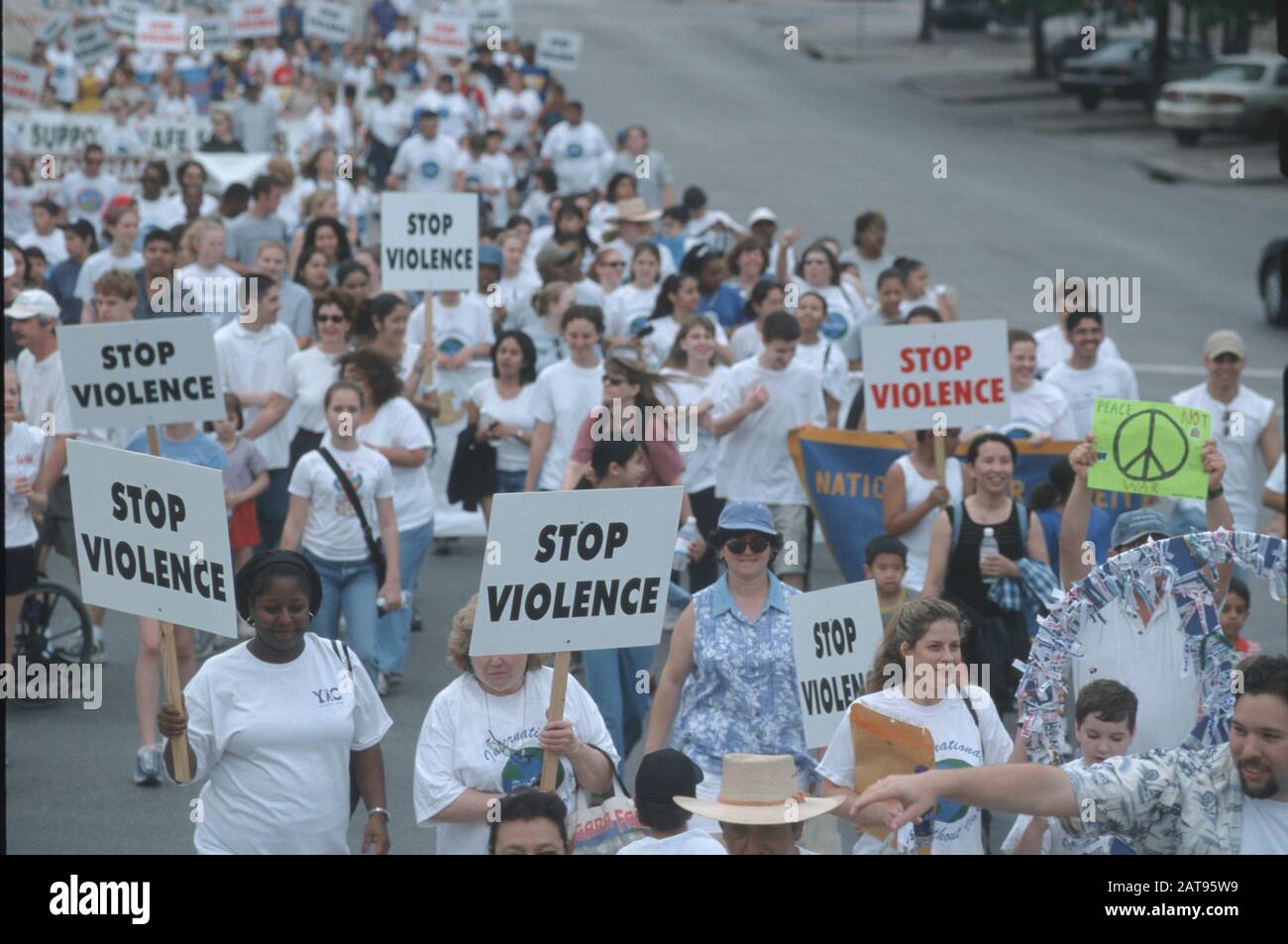 Austin, Texas: Day Without Violence rally marchers walk up Congress Avenue toward the Texas Capitol in downtown Austin. ©Bob Daemmrich Stock Photo