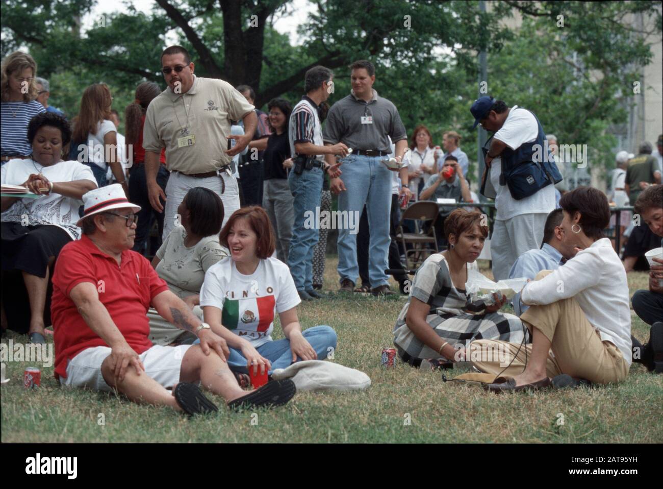 Austin, Texas Crowd celebrating Cinco De Mayo at city park. ©Bob