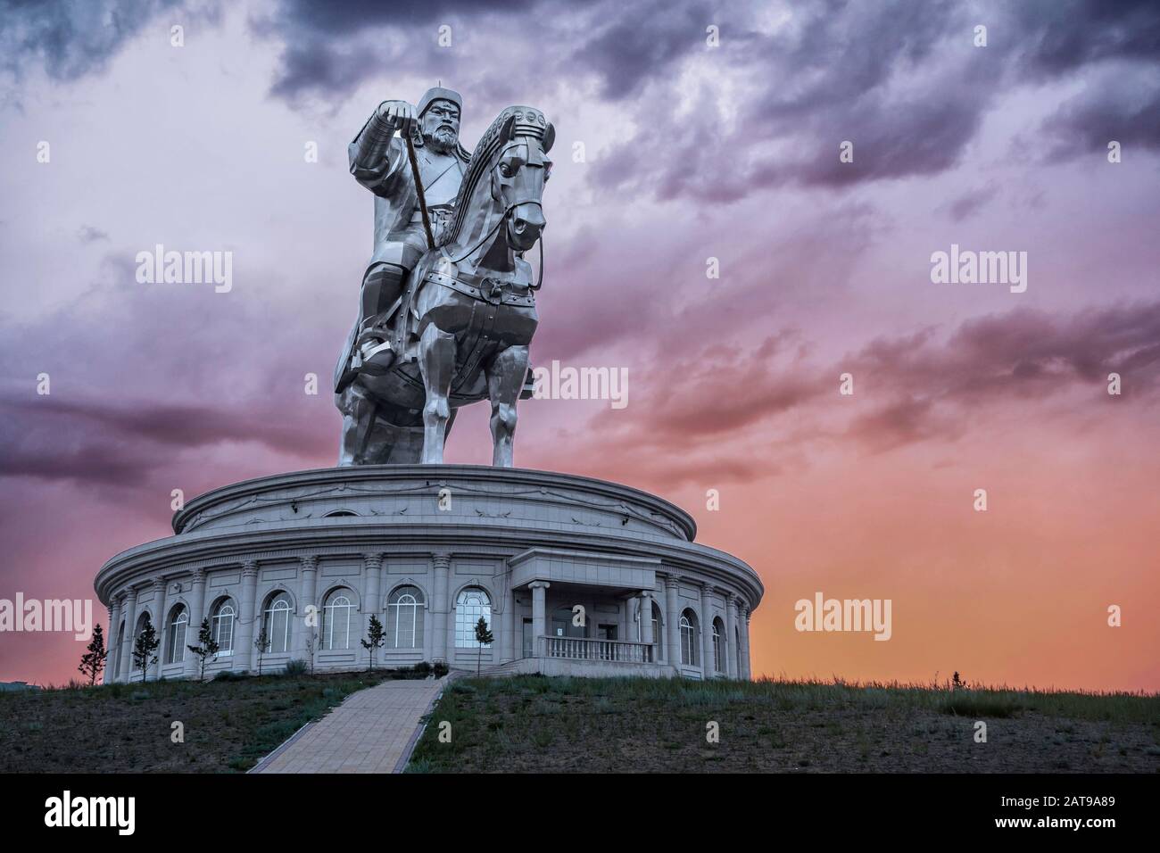 Sunset over the Genghis Khan Equestrian Statue at Tsonjin Boldog near Ulaanbaatar, Mongolia. Stock Photo