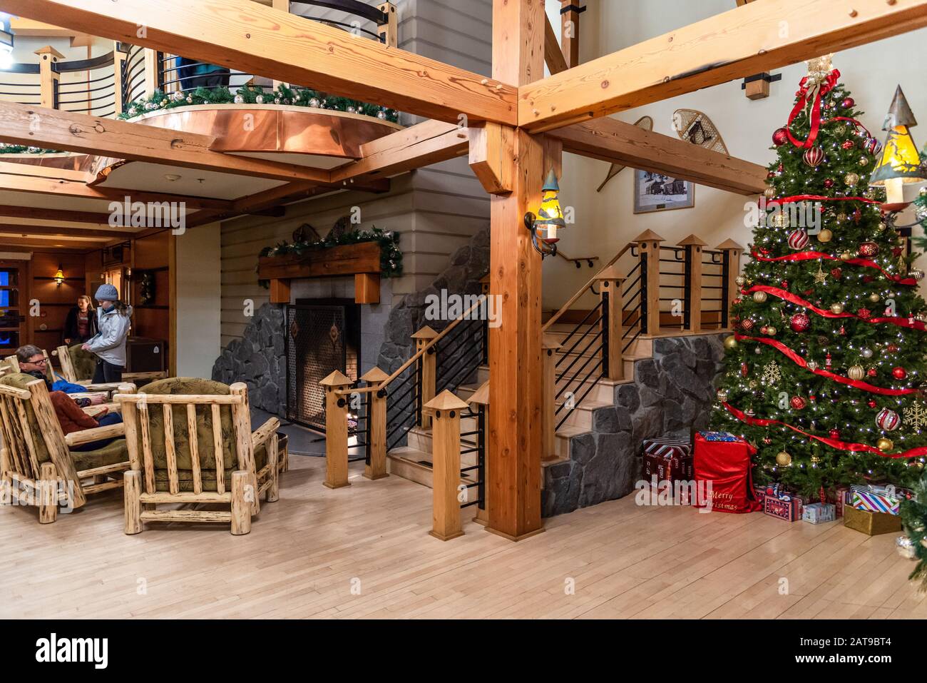 Christmas tree decorates the lobby of the Old Faithful Snow Lodge. Yellowstone National Park, Wyoming, USA Stock Photo