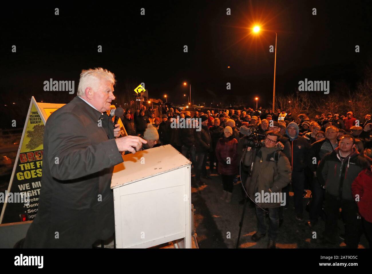 Declan Fearon from the campaign group Border Communities Against Brexit during a demonstration in Carrickcarnon on the Irish border, ahead of the UK leaving the European Union at 11pm on Friday. Stock Photo