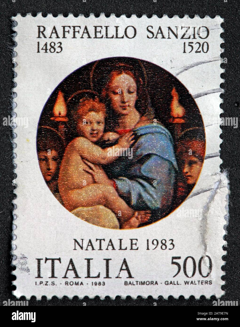 Italian stamp, poste Italia used and franked stamp,  Italia 500lire Raffaello Sanzio 1483-1520 Natale 1983- Roma - Baltimora Stock Photo