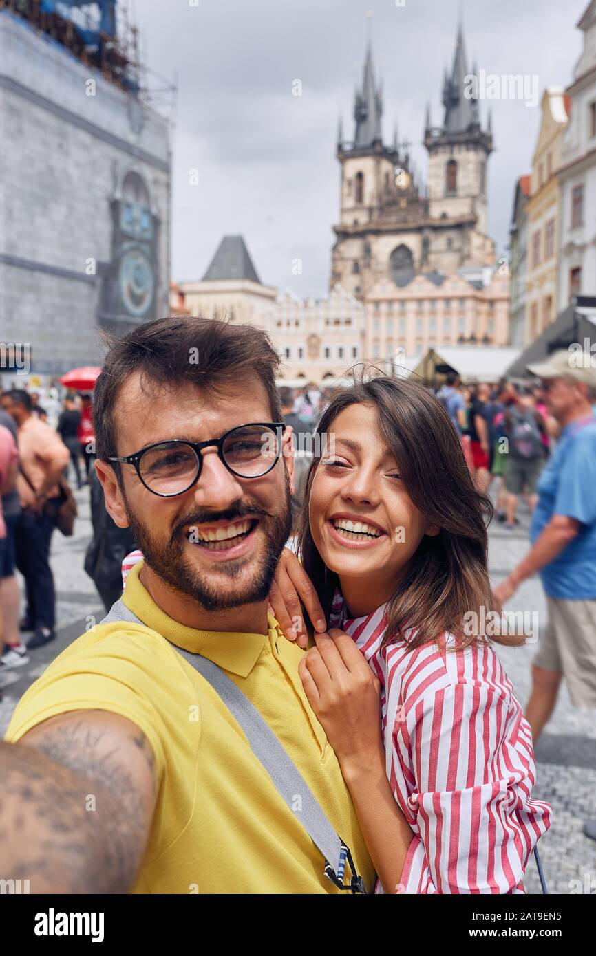 smiling couple in a vacation trip at Prag making selfie. Stock Photo