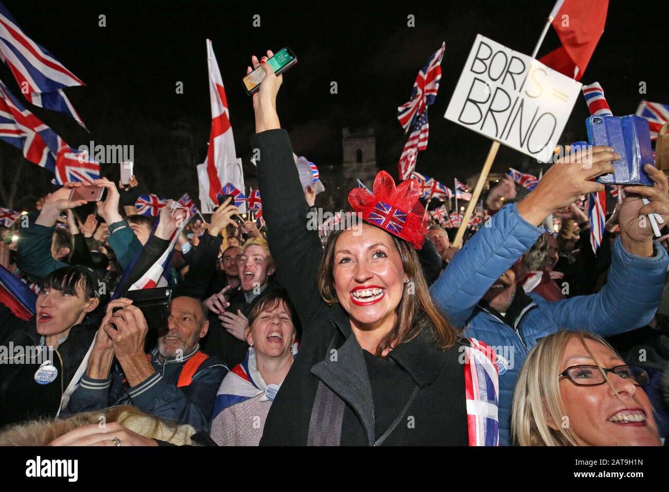 Pro-Brexit supporters celebrate in Parliament Square, London, after the UK left the European Union on Friday, ending 47 years of close and sometimes uncomfortable ties to Brussels. Stock Photo