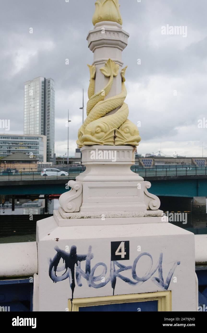 Sculpture of snakes is wrapped around the base of a light pole in outdoors in Belfast, Northern