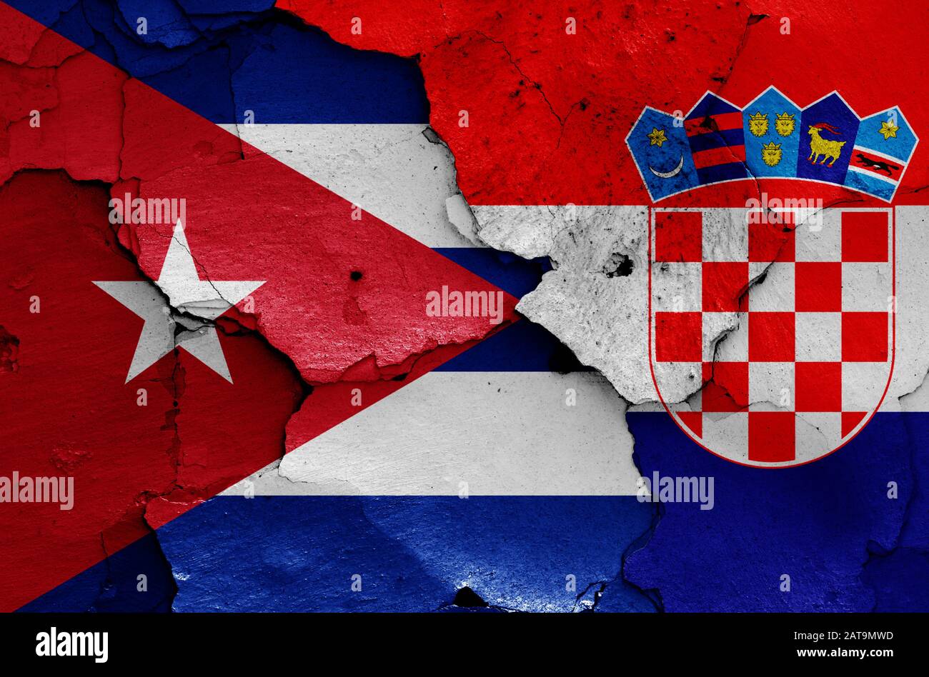 flags of Cuba and Croatia painted on cracked wall Stock Photo
