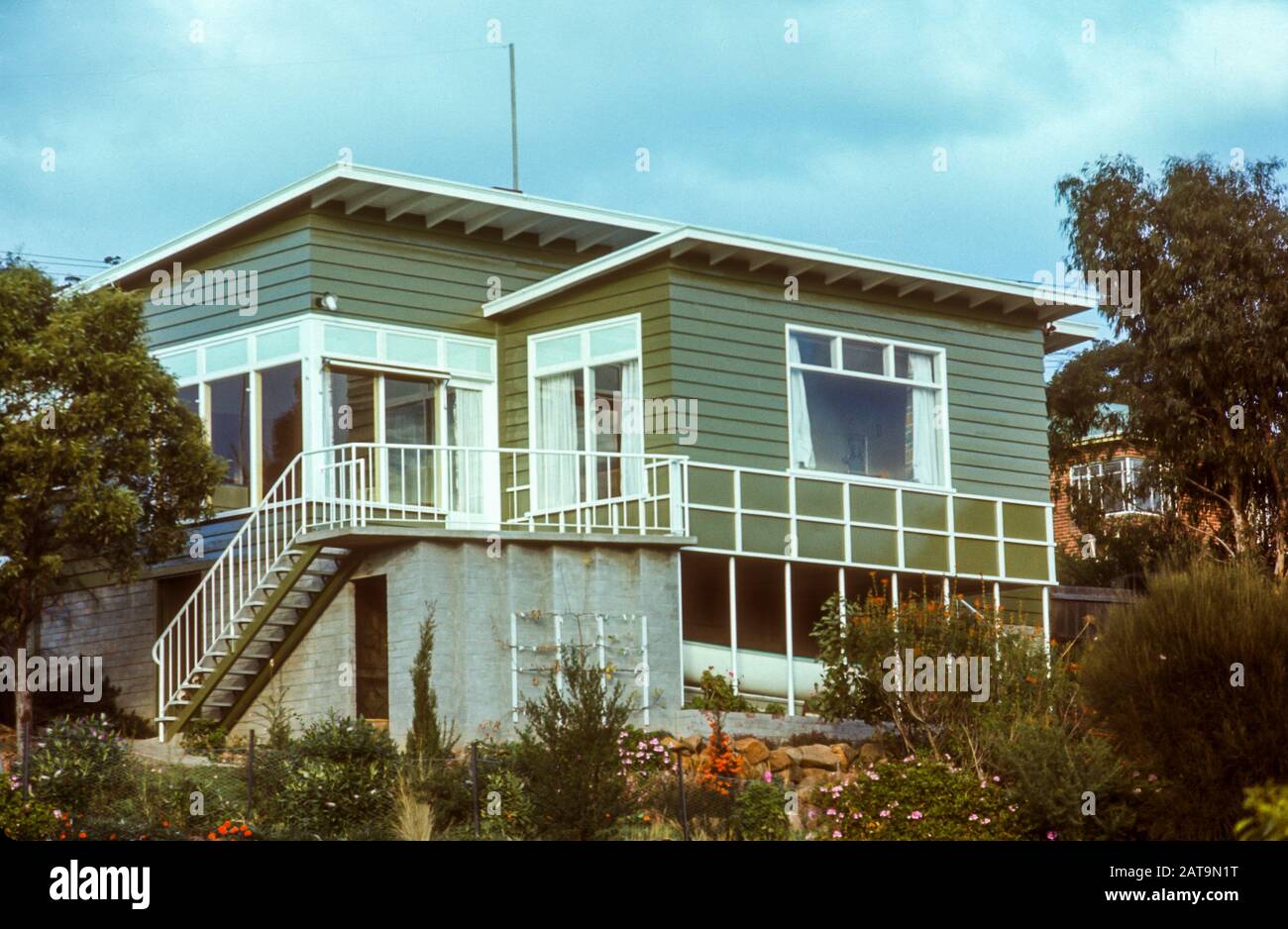Weatherboard family home built around 1954 in the Hobart suburb of Lindisfarne, Tasmania