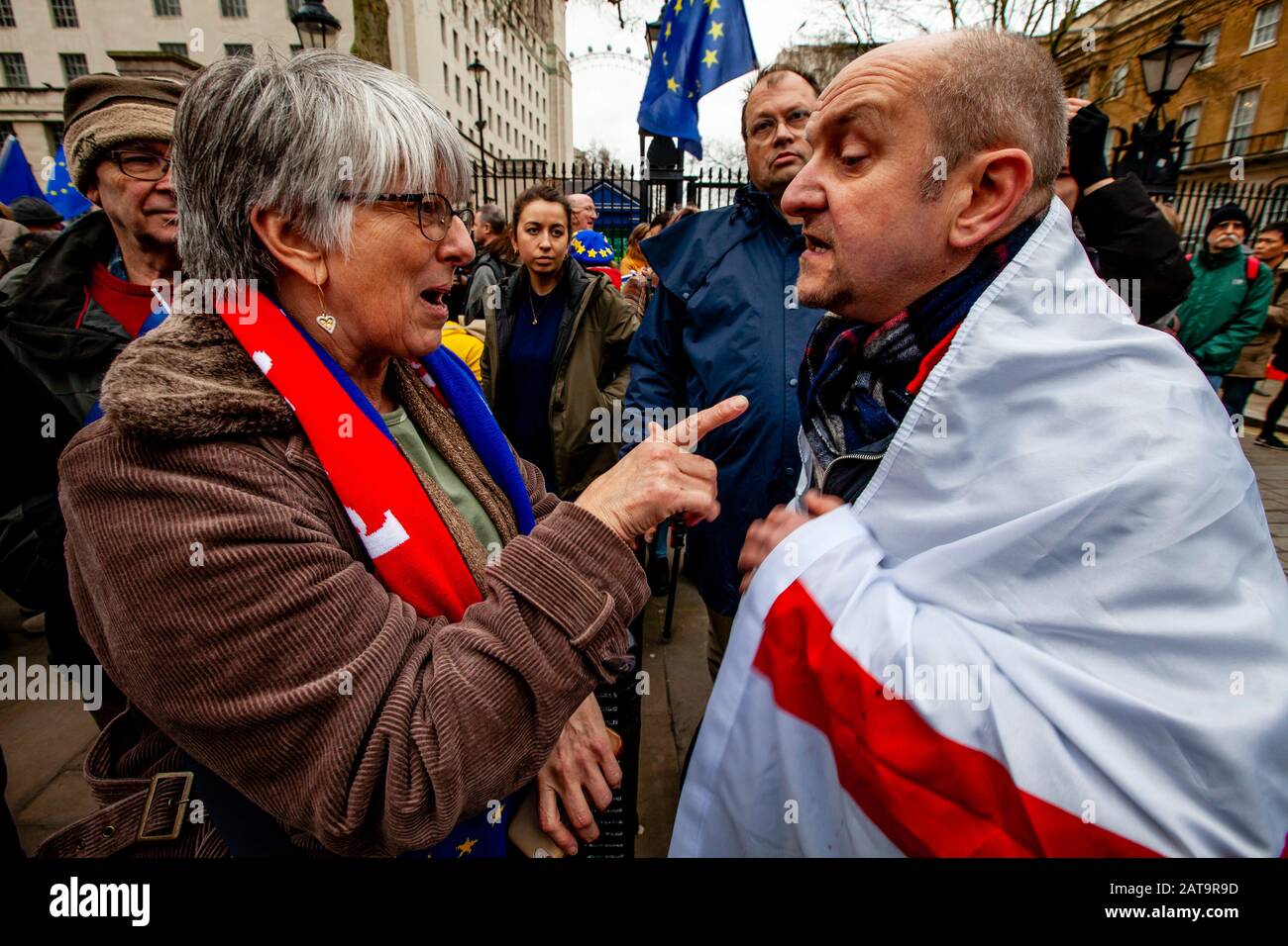 London, UK. 31st Jan, 2020. A confrontation beween a remainer and Brexit supporter near Parliament Square, London as Brexit supporters gather to celebrate Britain leaving the EU. Credit: Grant Rooney/Alamy Live News Stock Photo