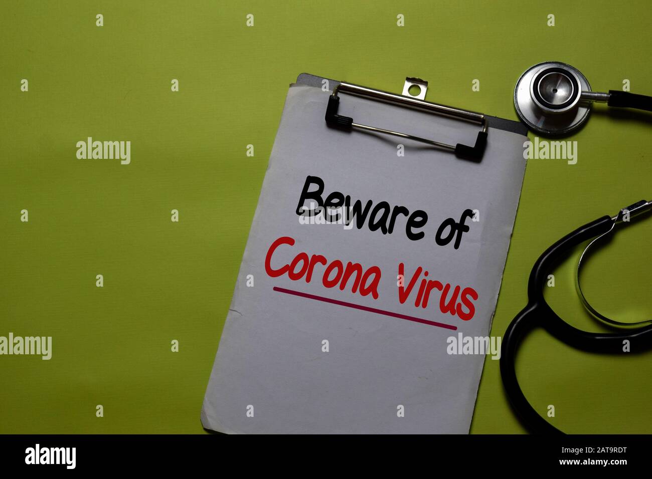 Beware of Corona Virus write on a paperwork isolated on Office Desk. Mysterious Viral Pneumonia in Wuhan, China. Healthcare/Medical concept Stock Photo