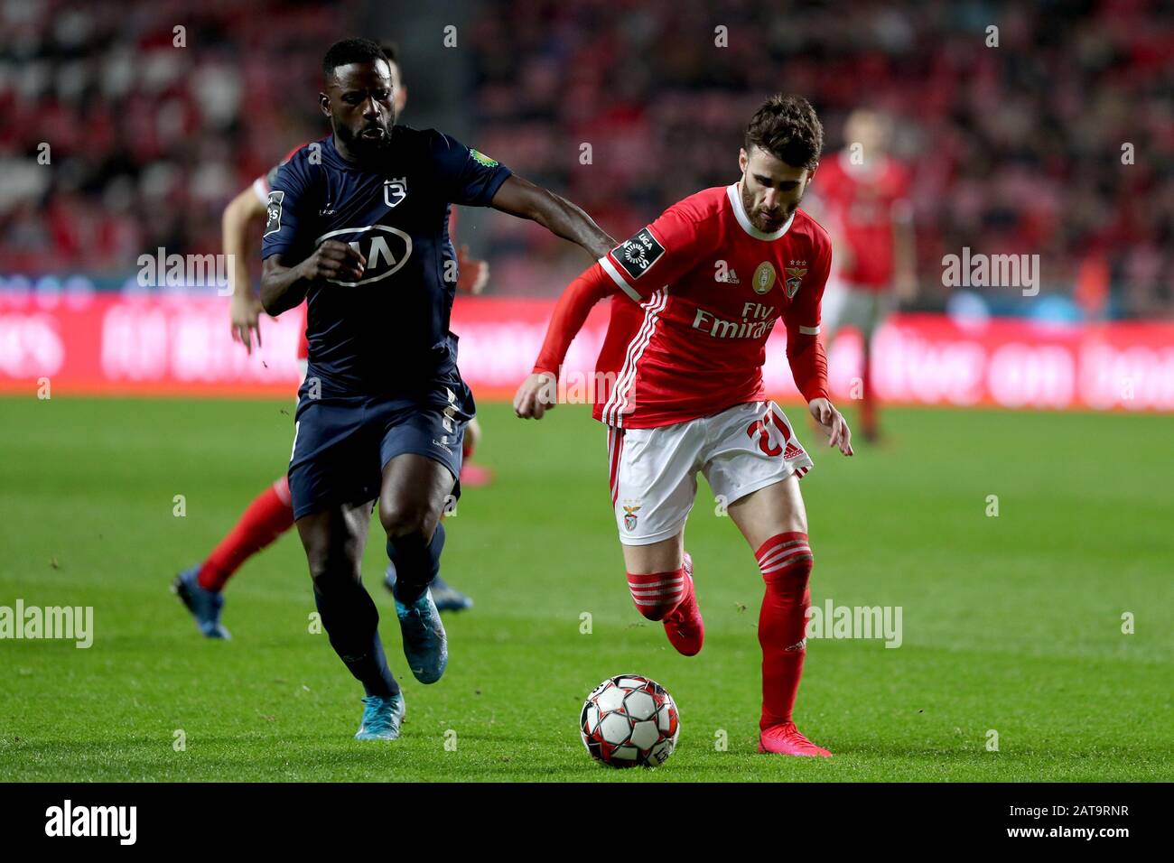 Lisbon. 31st Jan, 2020. Rafa Silva of SL Benfica (R) competes during the Portuguese League football match between SL Benfica and Belenenses SAD in Lisbon, Portugal on Jan. 31, 2020. Credit: Pedro Fiuza/Xinhua/Alamy Live News Stock Photo