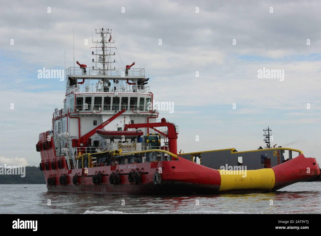 Red mining ship at Balikpapan Bay Stock Photo