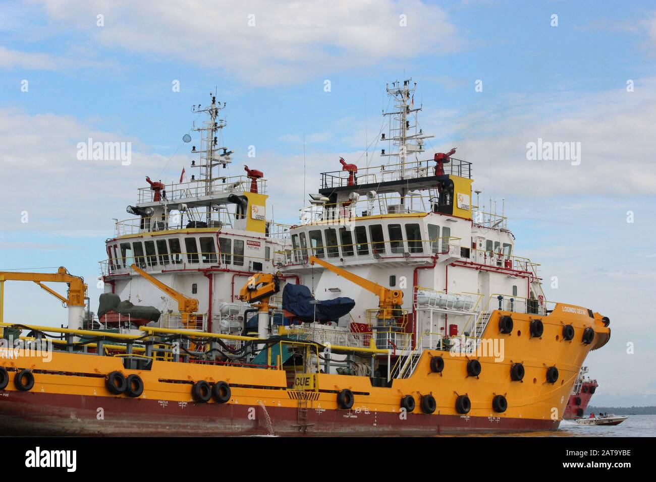 Twins yellow mining ships Stock Photo
