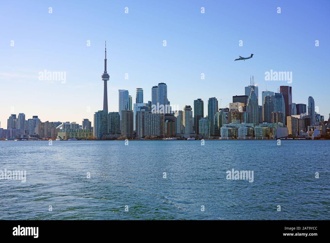 TORONTO, CANADA -26 MAR 2019- View of an airplane from Canadian airline Porter Airlines (PD) in approach at the Billy Bishop city airport (YTZ) over t Stock Photo