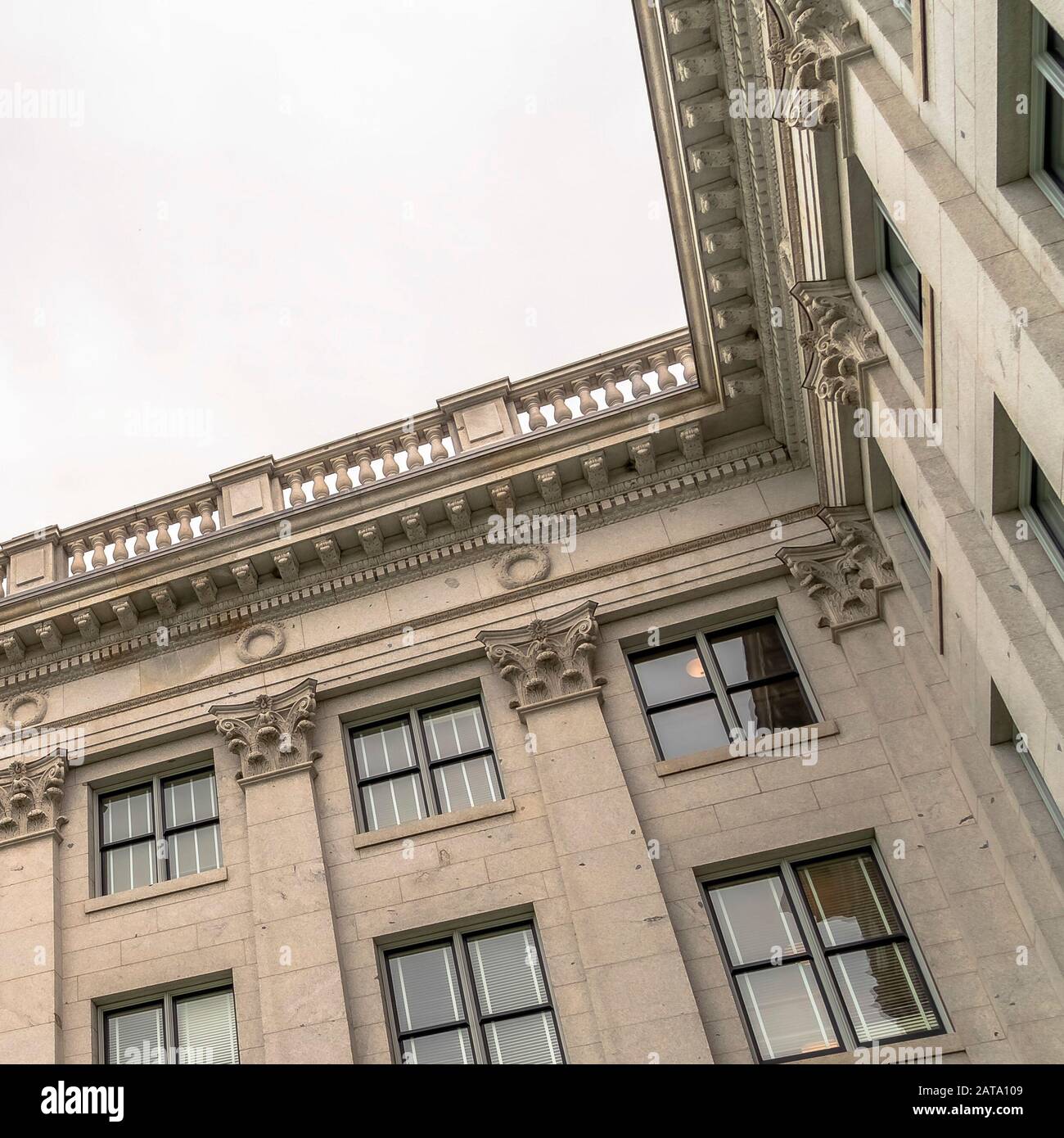 Square Frame Building With Decorative Wall Mouldings And Shiny