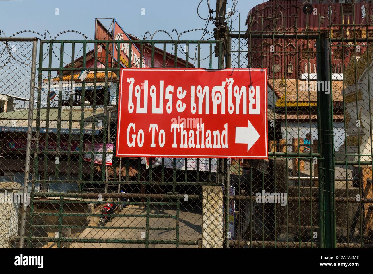 Sign at the Mae Sai border of Thailand and Myanmar, pointing to Thailand. Stock Photo