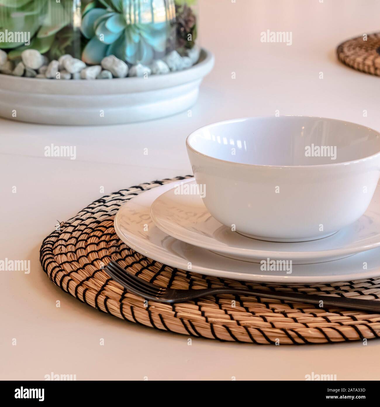 Photo Square frame Bowl plate and utensils on round placemat against