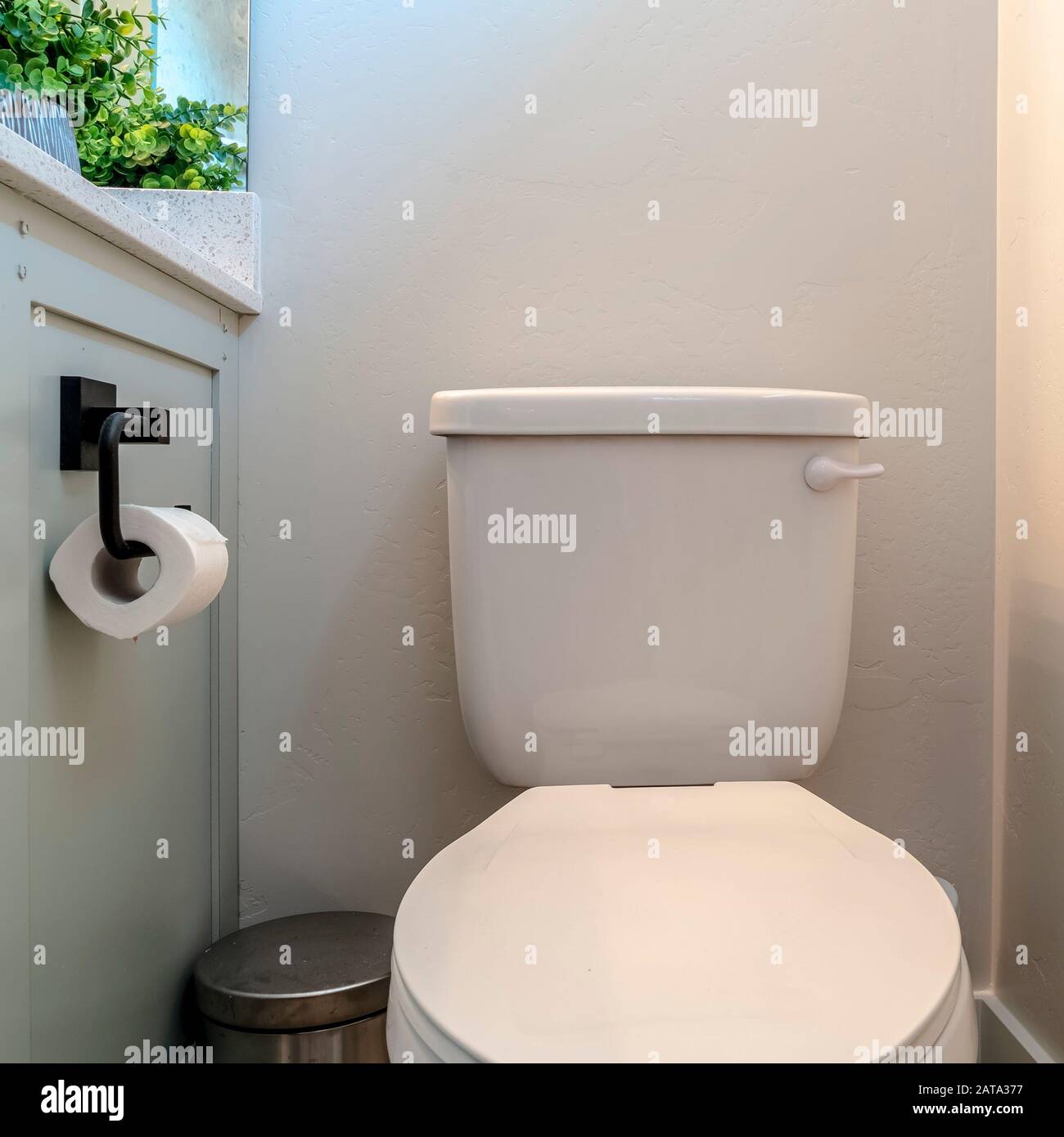 Square Toilet trash can and with tissue holder against white